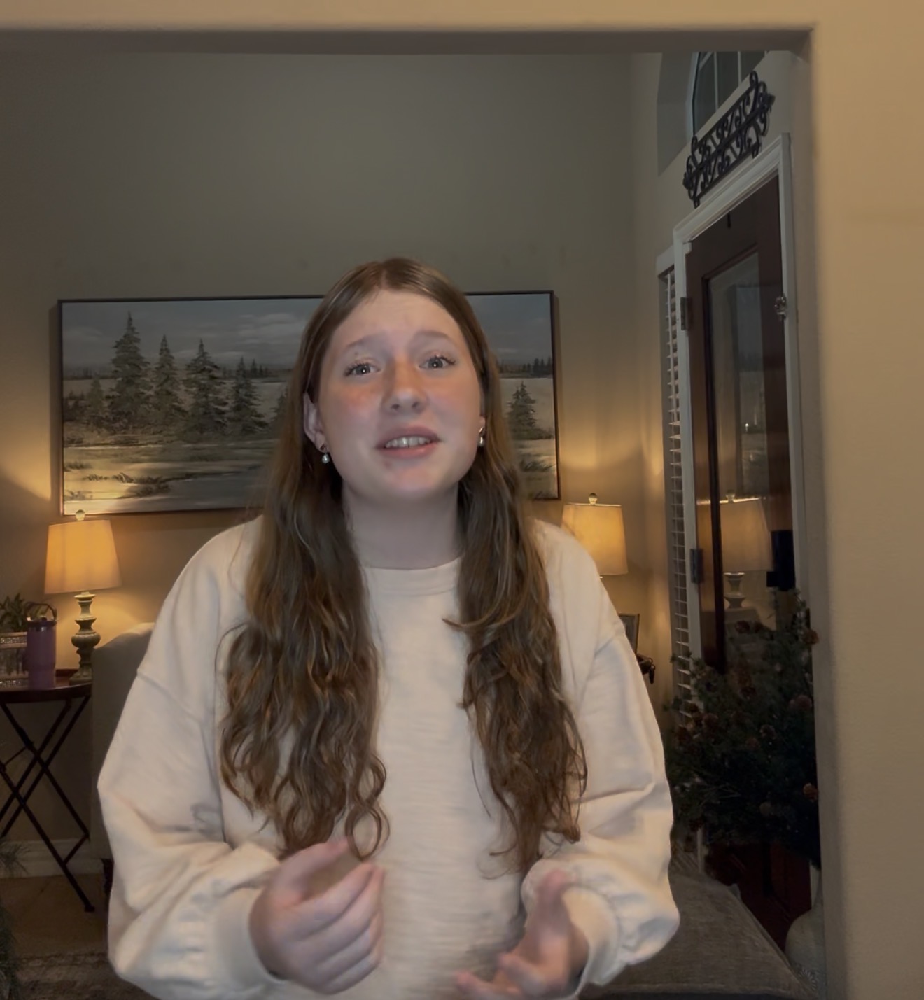Cessac sister singing during audition video recording in voice lesson