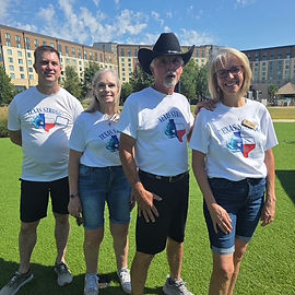 Natural Blend singing group in Texas Strong shirts at the Kalahari Water Park flood relief event