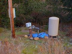 Private water well system and pressure tank