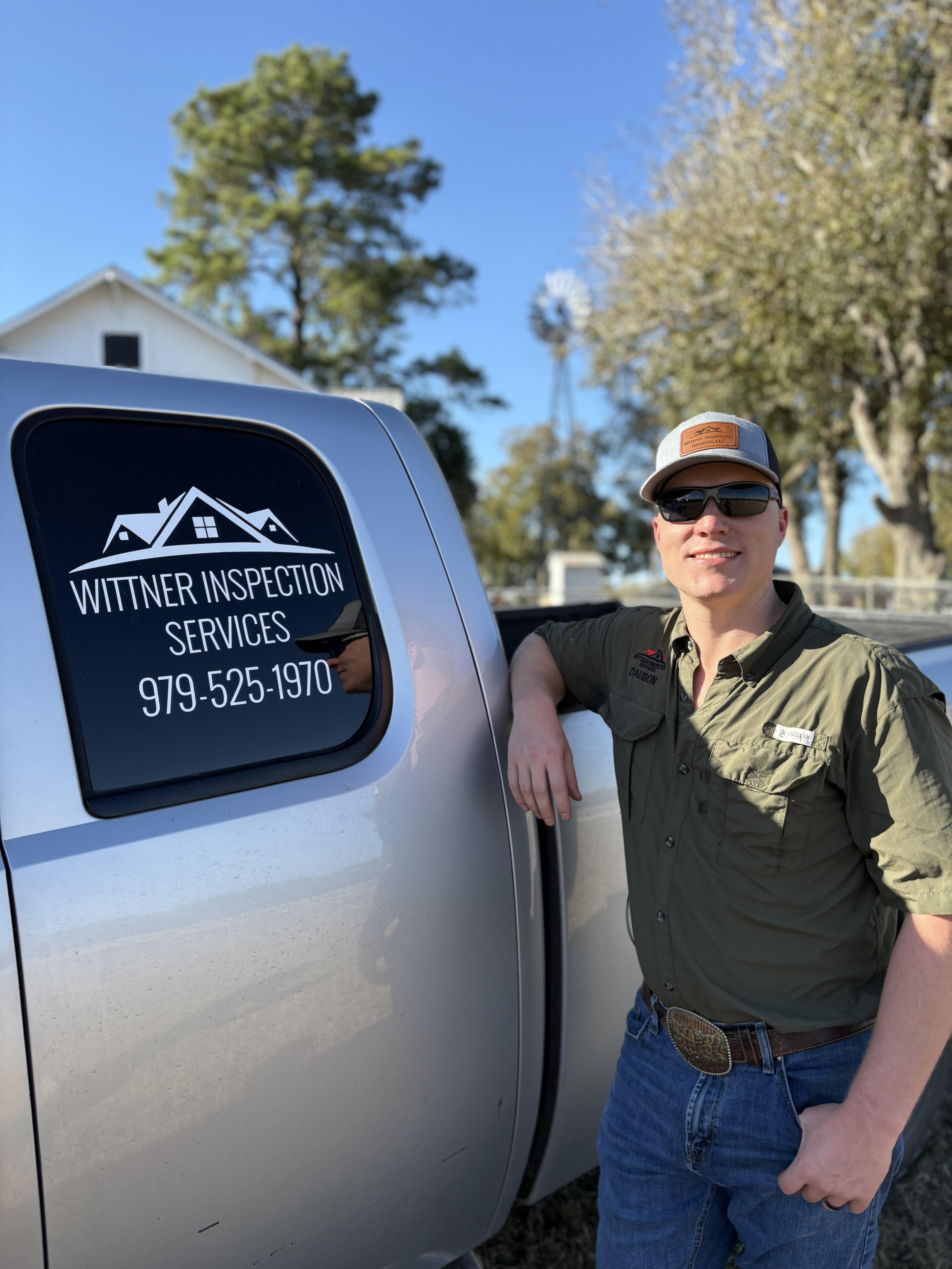 Dauson Wittner standing with Wittner Inspection Services truck