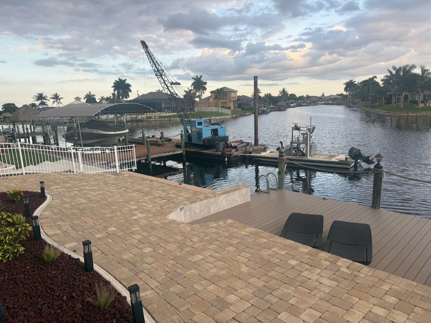 Before: crane barge setting pilings during construction in Cape Coral