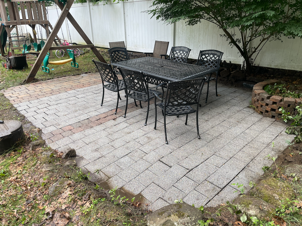 Paver patio — moss and grime washed clean — after