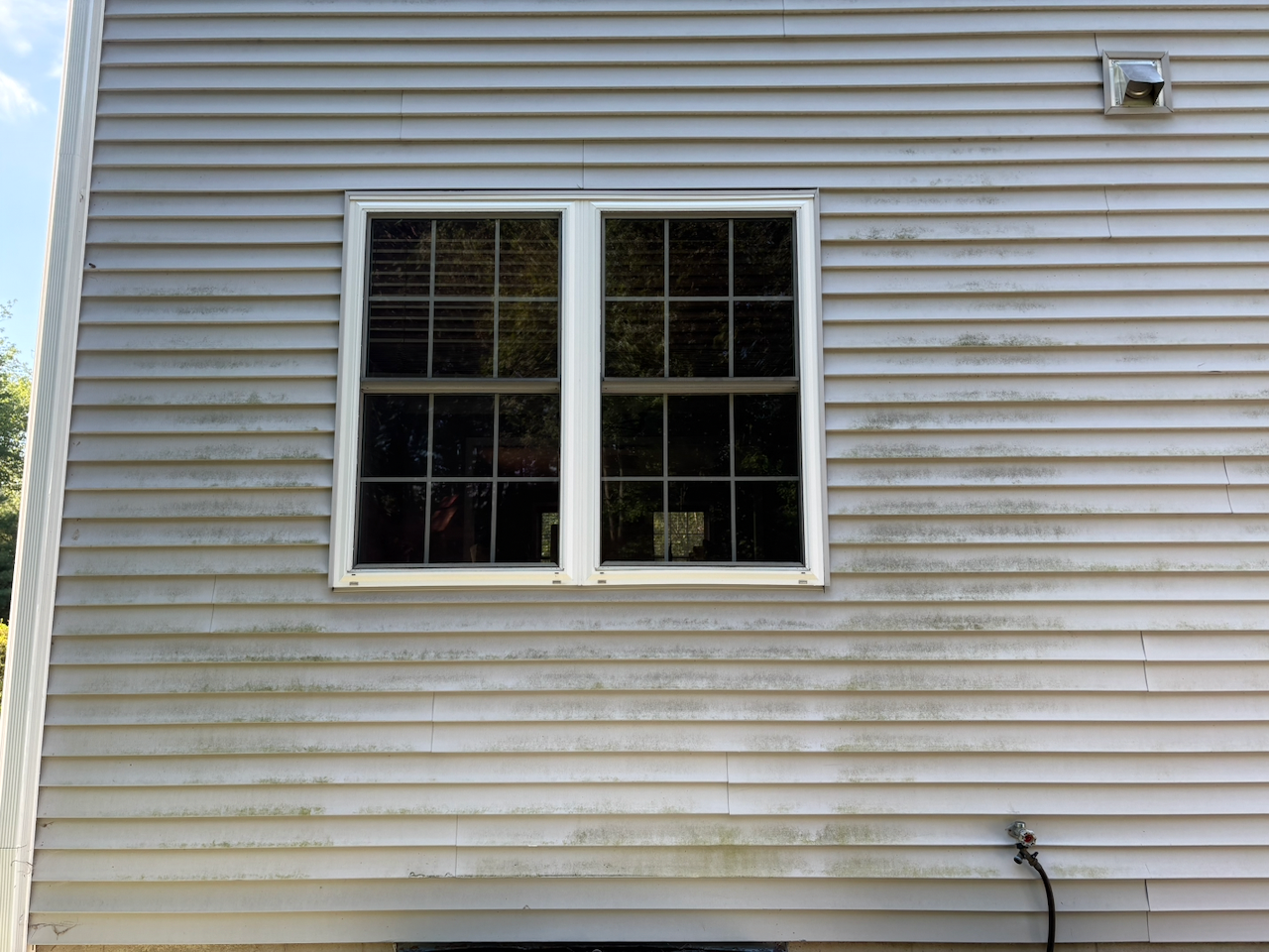 Dirty paver patio before pressure washing in Northborough, MA