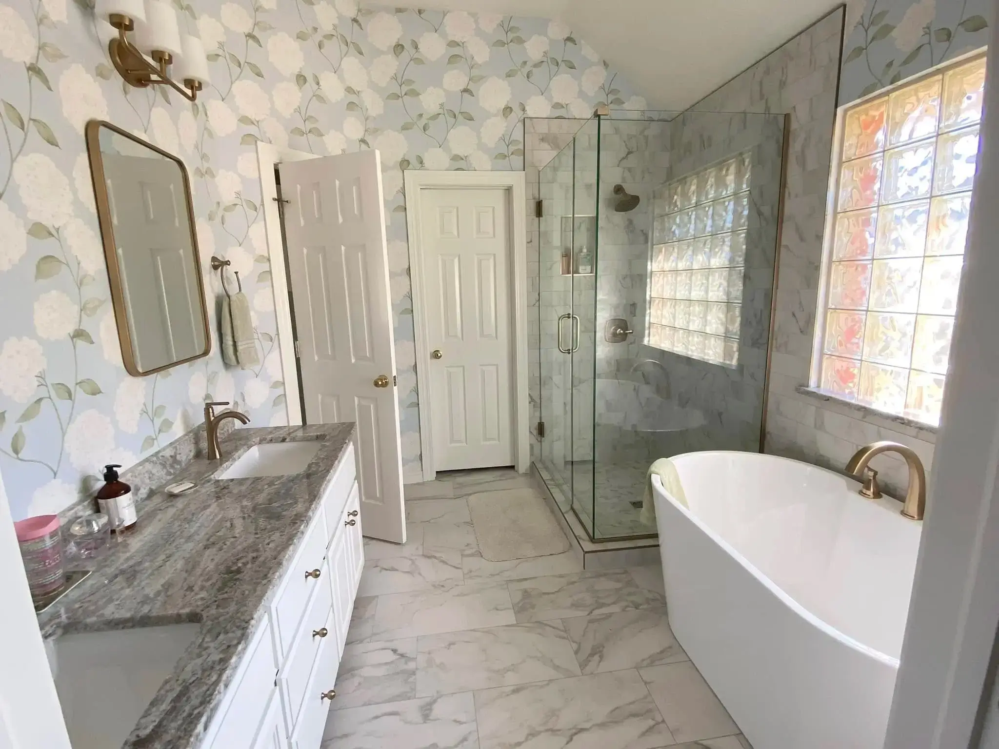 Porcelain tile and vanity display with LED backlit mirror in Stillwater showroom