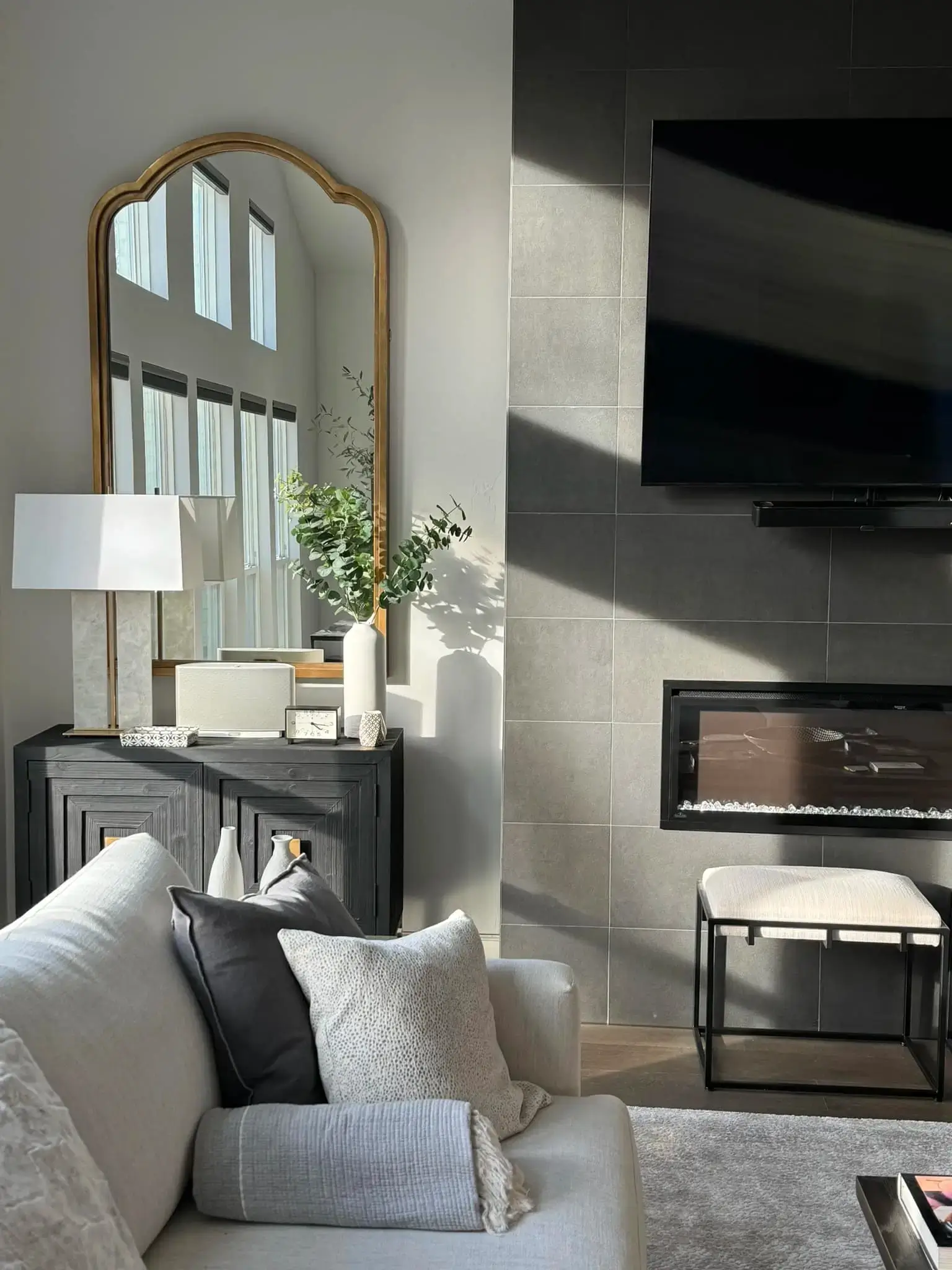 Modern large-format tile fireplace surround and living room remodel in Stillwater OK