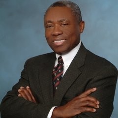 Carl Anku of IntegrityOne Commercial Real Estate, smiling