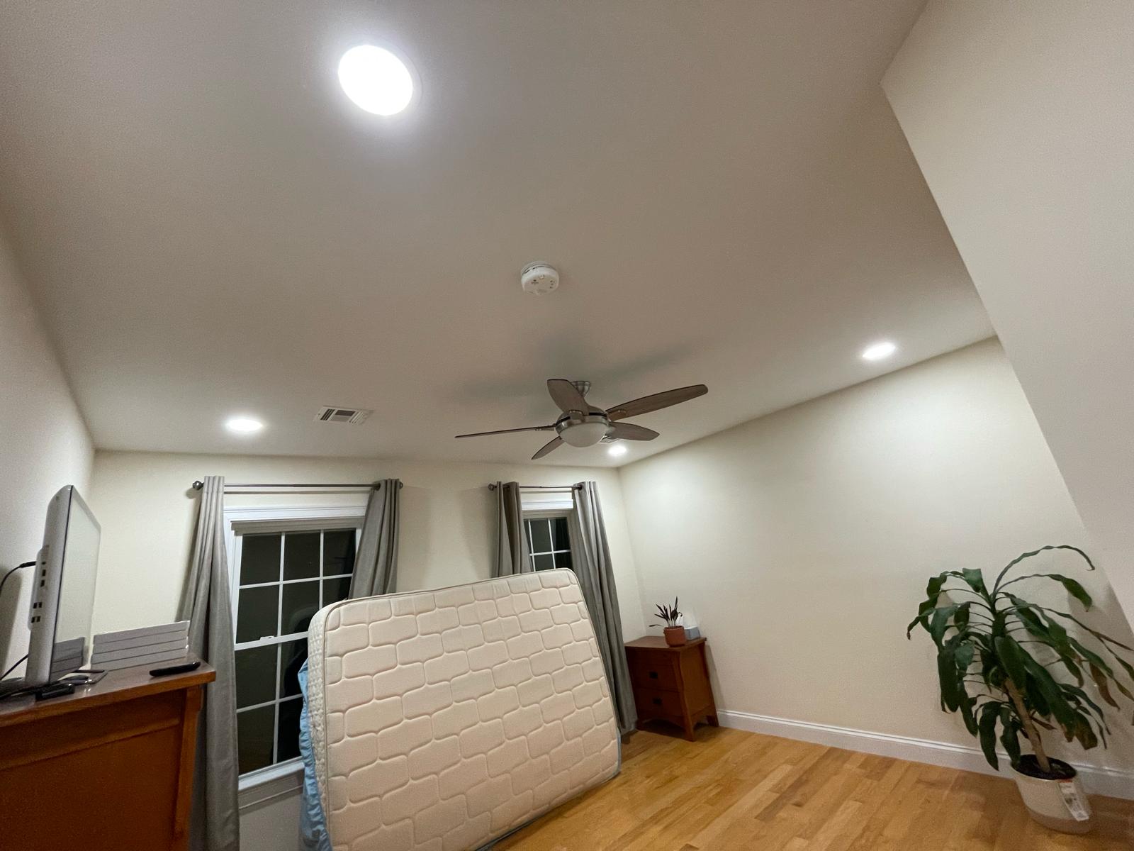 Vaulted ceiling fan installation with recessed LED downlights and hardwired smoke detector by Prime Light Electric LLC in Worcester MA