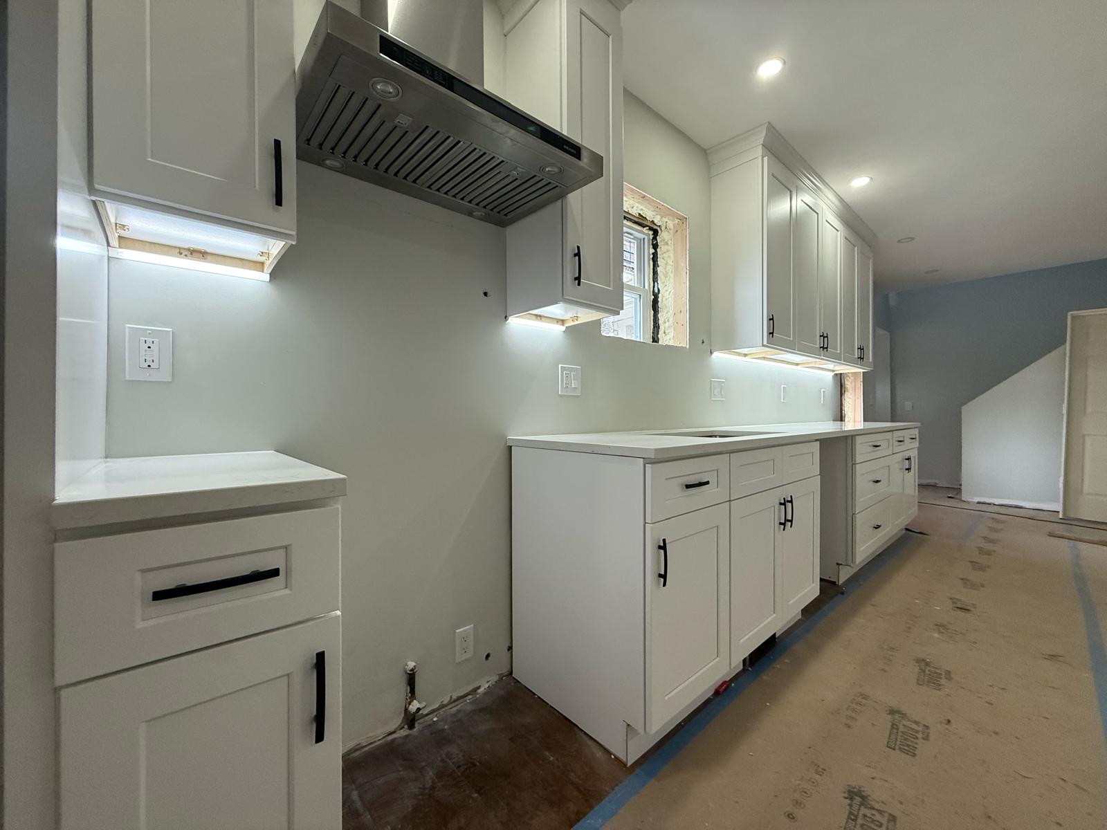 Custom under-cabinet LED task illumination and dedicated GFCI small appliance kitchen circuits by Prime Light Electric LLC in Holden MA