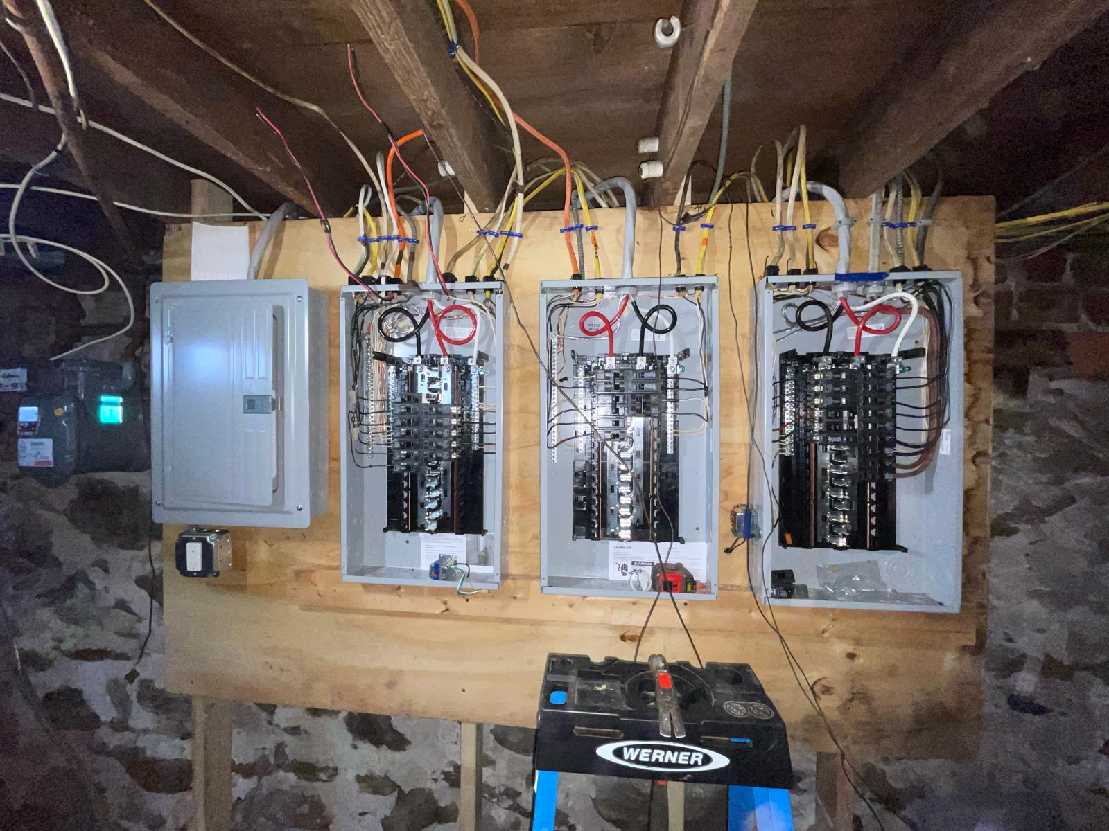 Multi-unit apartment building electrical breaker panel bank rough-in wiring by Prime Light Electric LLC in Worcester MA