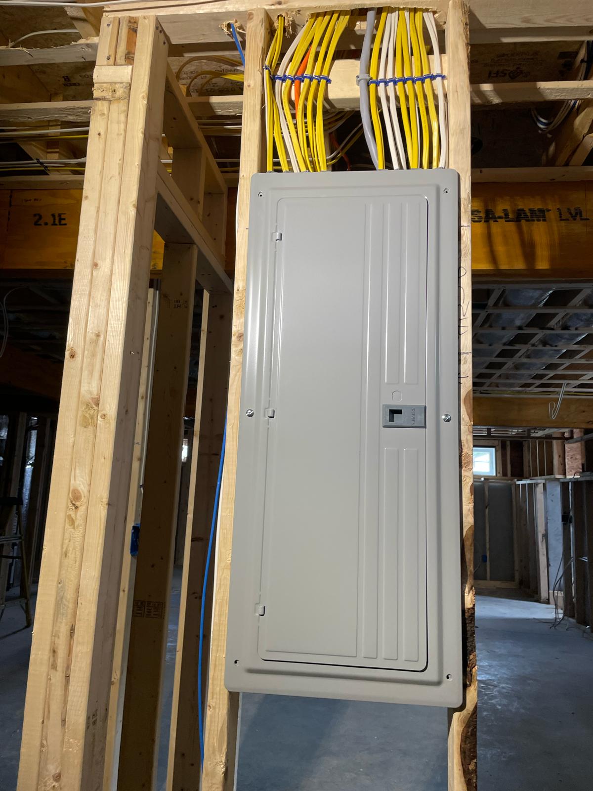 New construction Siemens 200-amp main breaker panel with bundled branch circuit home runs installed by Prime Light Electric LLC in Northborough MA