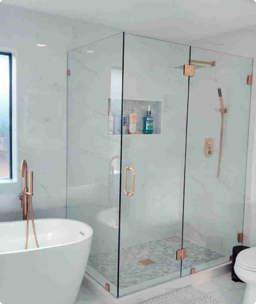 Frameless glass splash panel in a modern bathroom