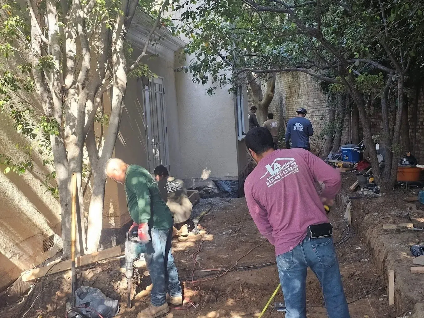 LA Builder Construction crew working on excavation and foundation prep in Van Nuys, CA