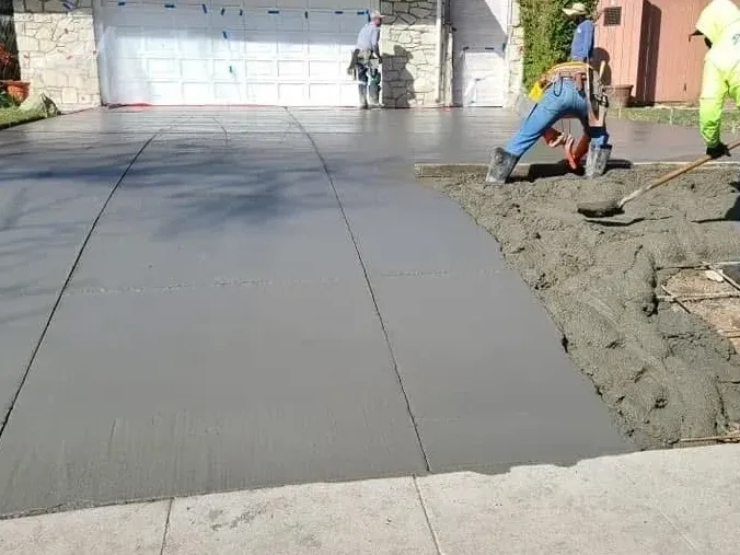 Commercial residential concrete driveway smooth finish installation by LA Builder