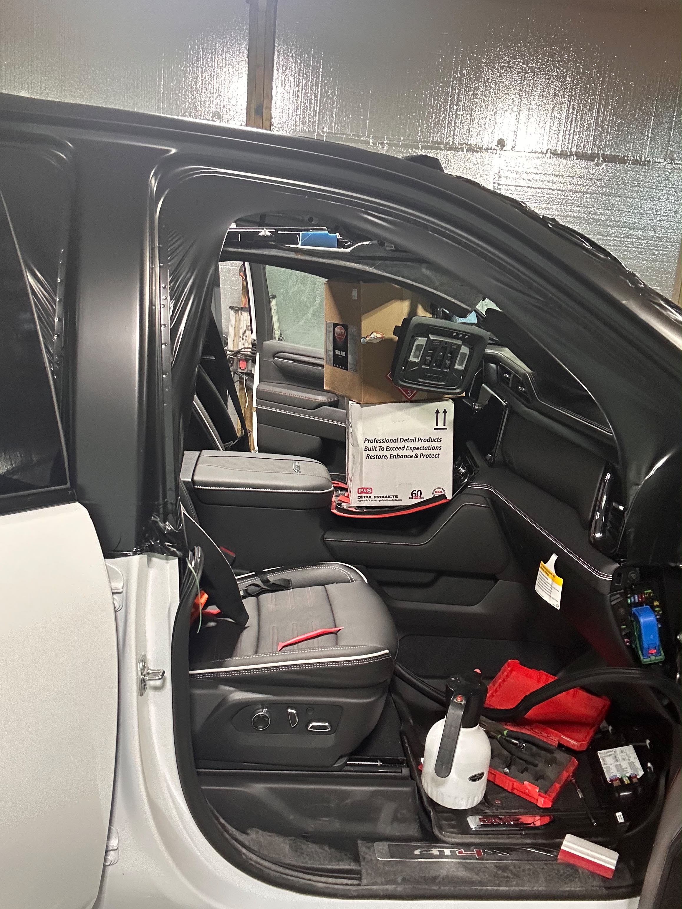 GMC AT4X interior door frame and pillar vinyl wrap detail in progress with professional P&S detail products by Miracle Detailing