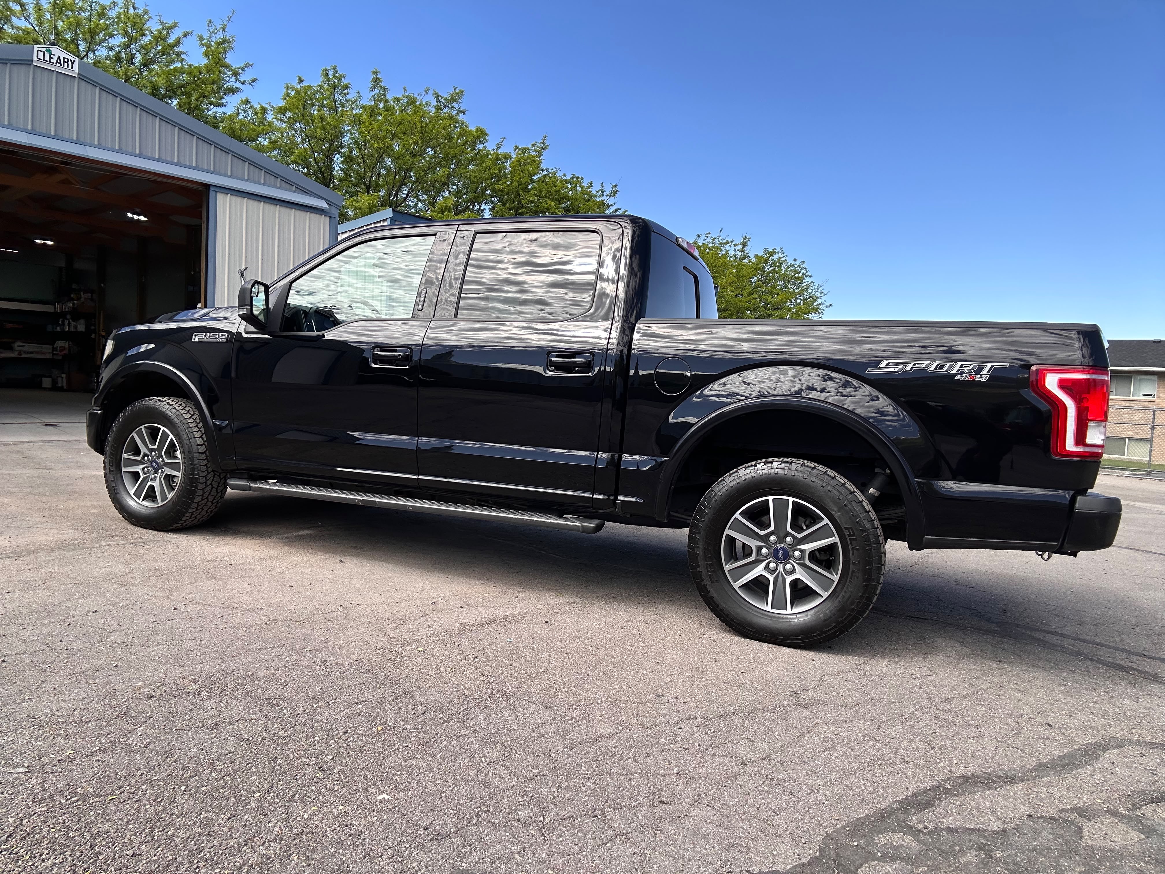 Miracle Detailing team restoring a vehicle to a mirror gloss finish in Lindon Utah