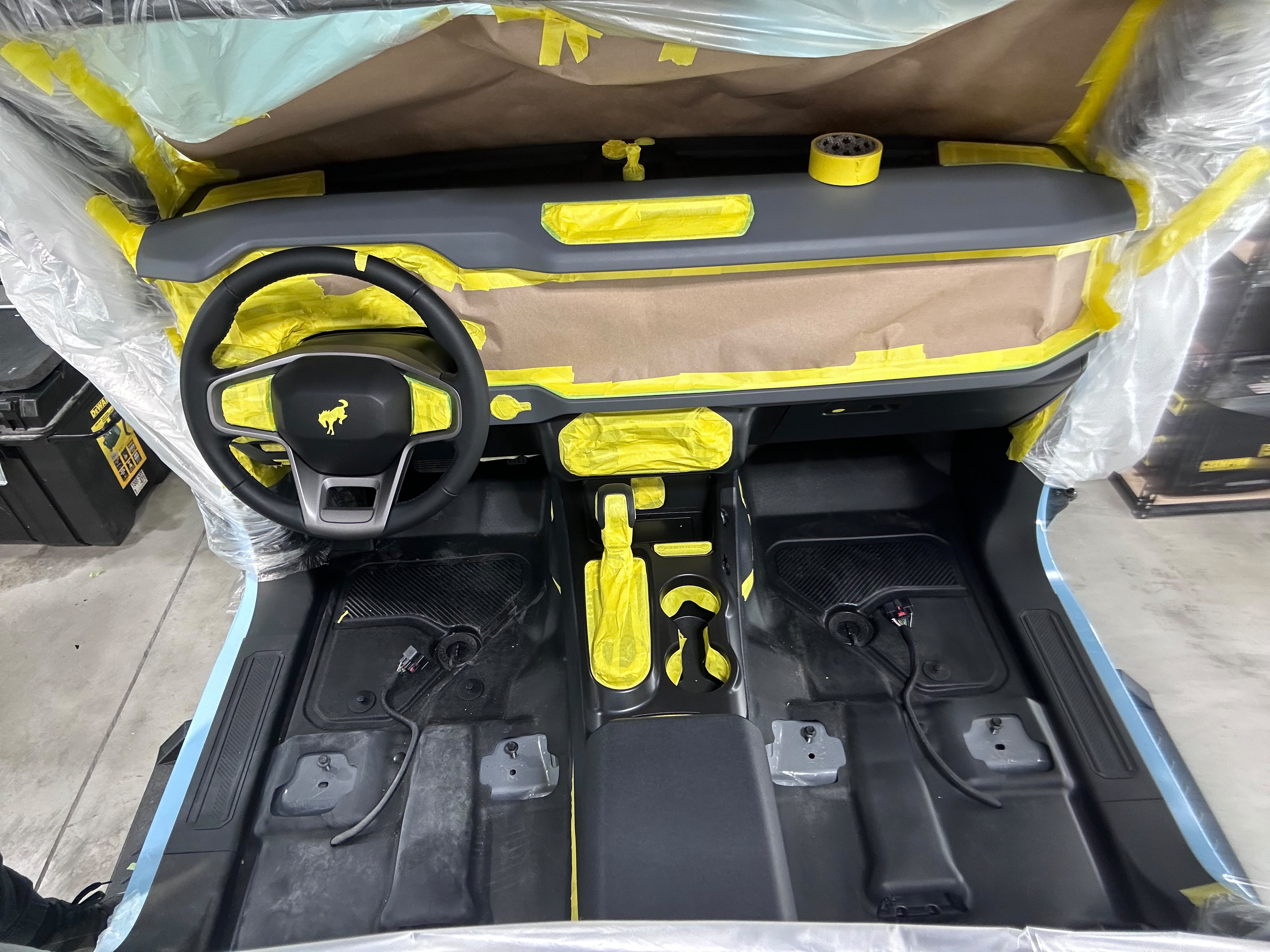 Ford Bronco complete cabin interior stripped and precision taped with yellow masking paper for interior ceramic coating by Miracle Detailing Lindon UT