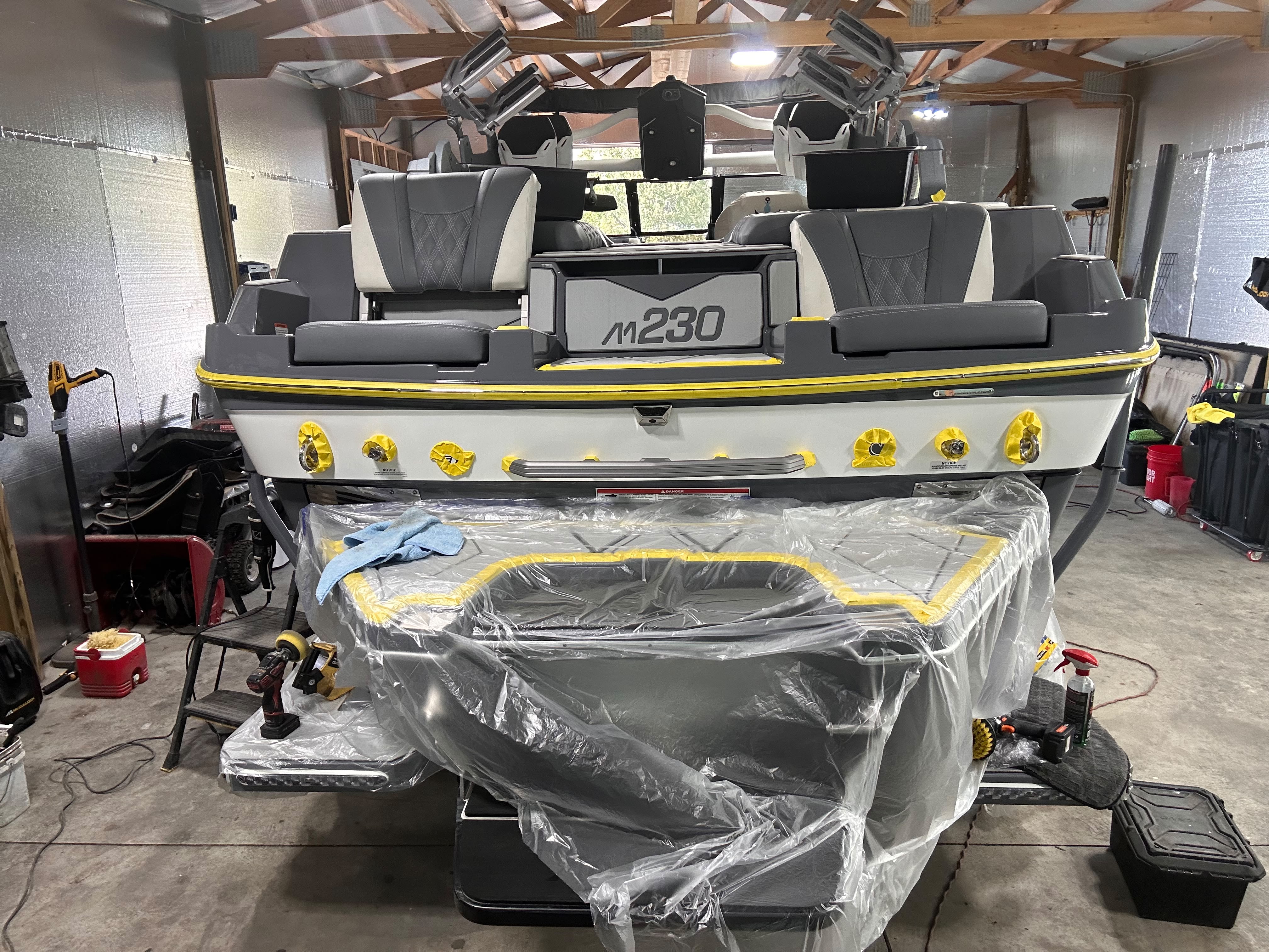 Malibu M230 wakeboard boat stern swim deck prepped and masked for marine gelcoat restoration by Miracle Detailing