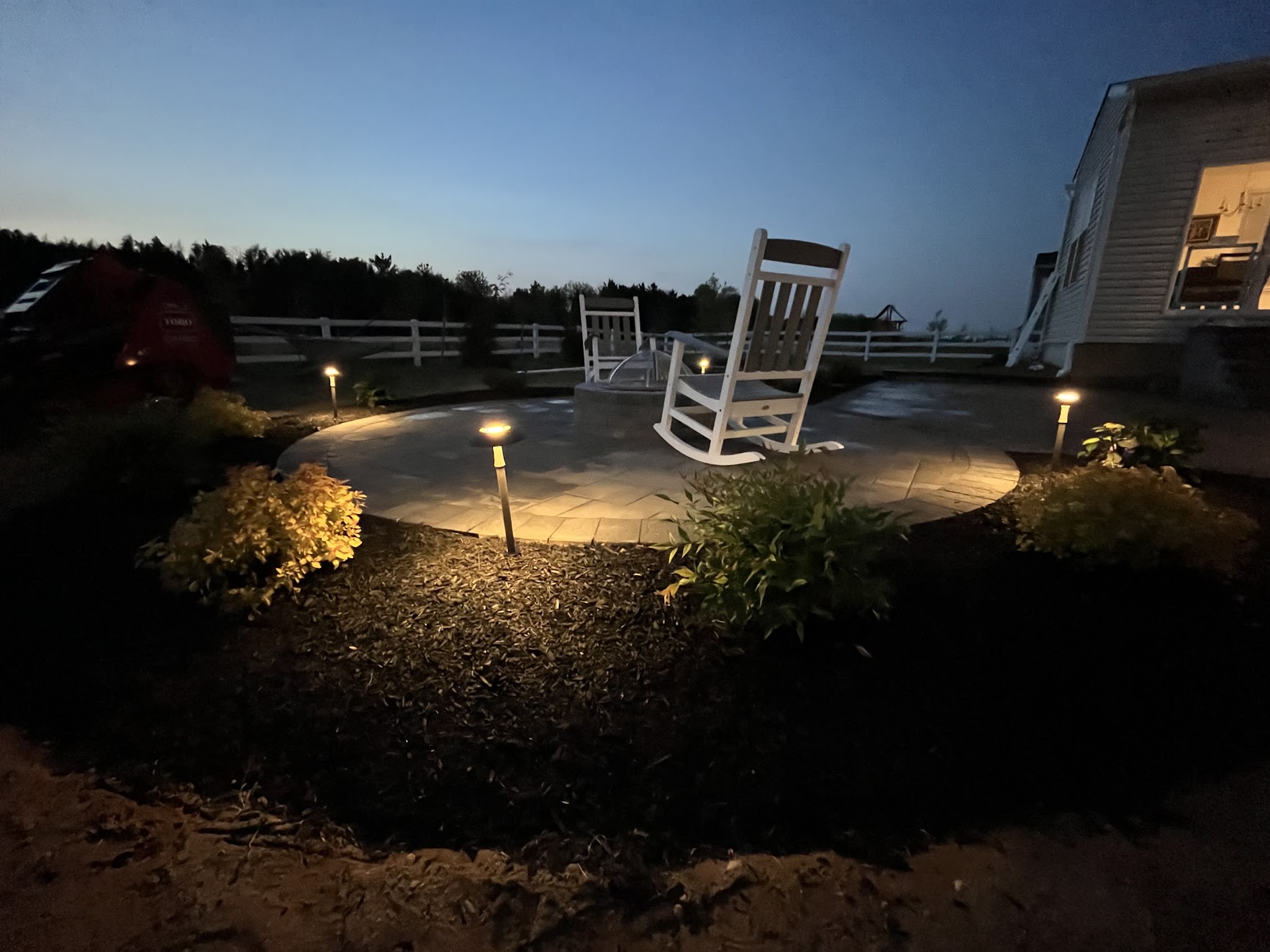 Evening Ambience: Fire Pit Lounge with Accent Landscape Lights