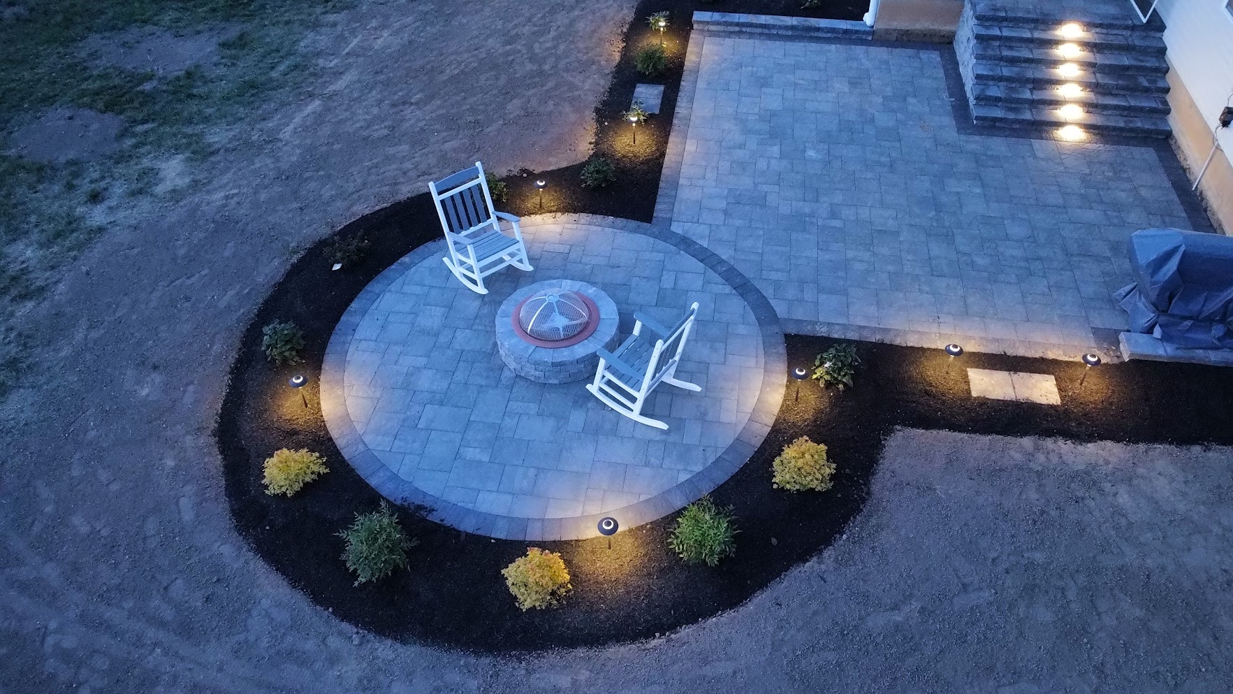Aerial Drone View: Circular Fire Pit Patio & Paver Terrace