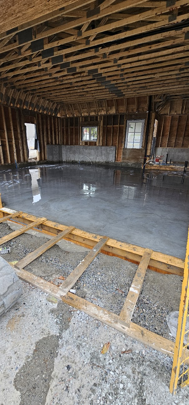 Concrete slab inside a framed residential building prepared and completed by Can Concrete
