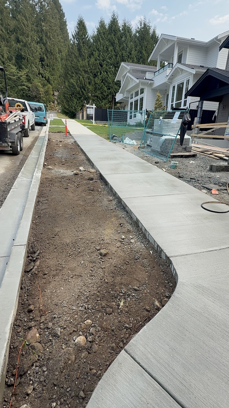 Finished concrete sidewalk at a residential development project