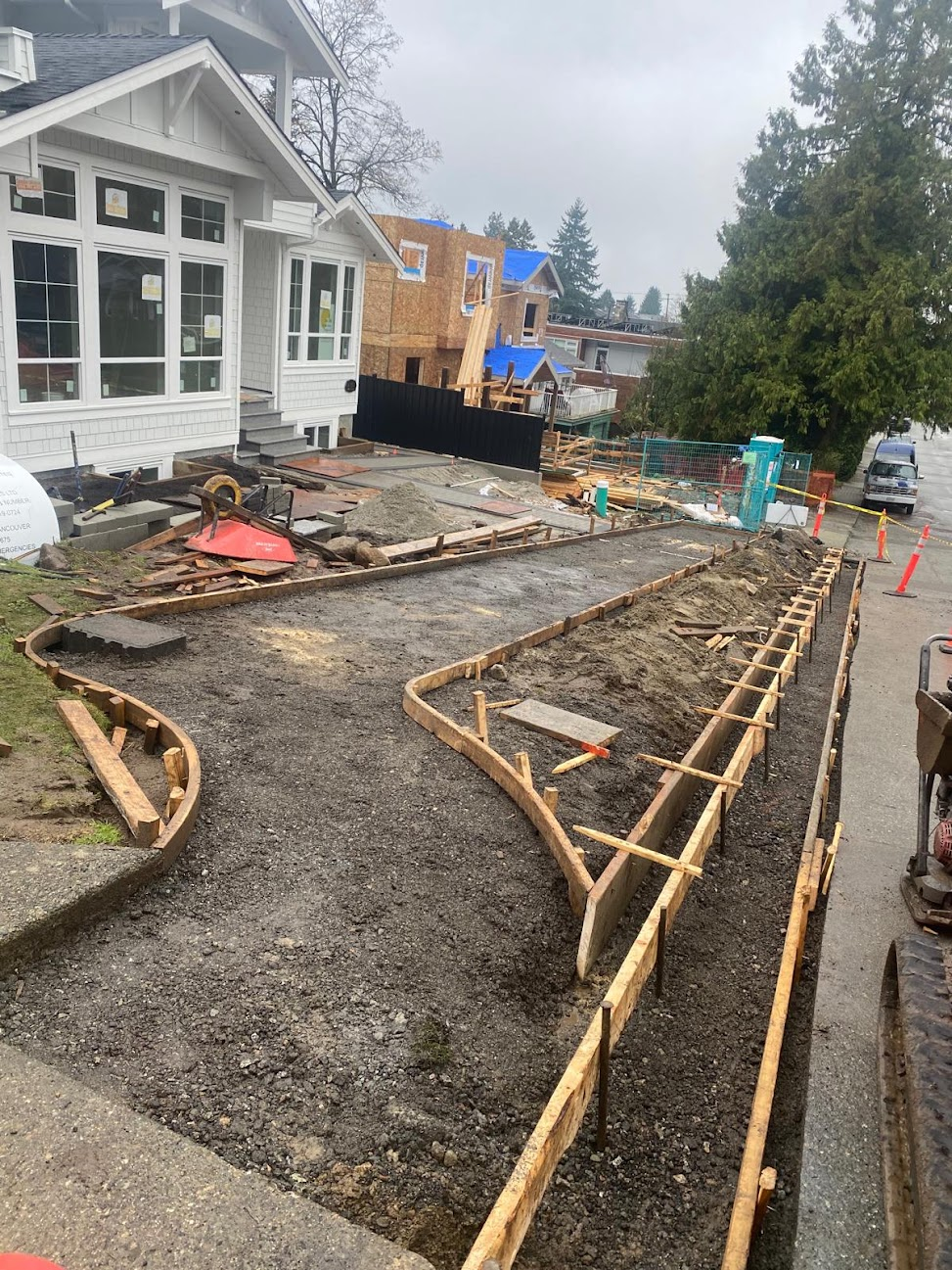 Curved timber forms laid out for a residential concrete project