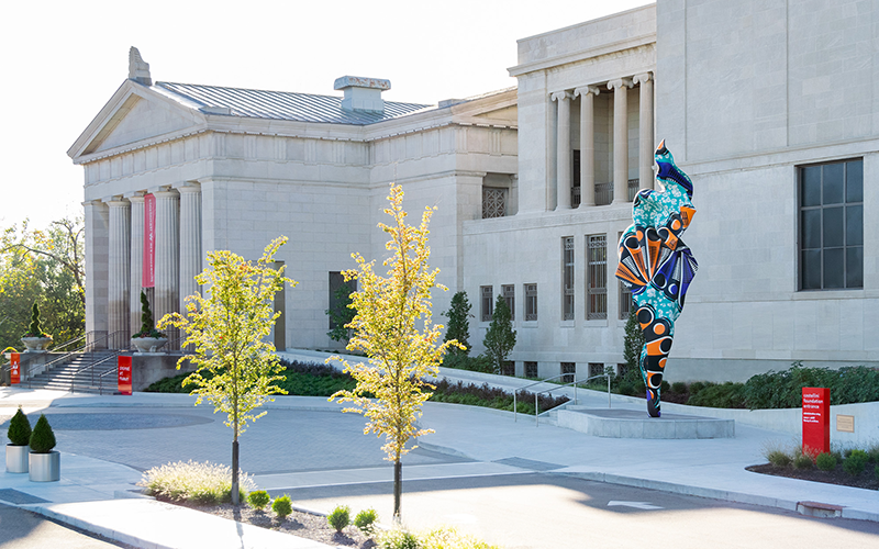 Exterior view of the Cincinnati Art Museum in Eden Park, Mt. Adams, with a colorful sculpture outside the entrance