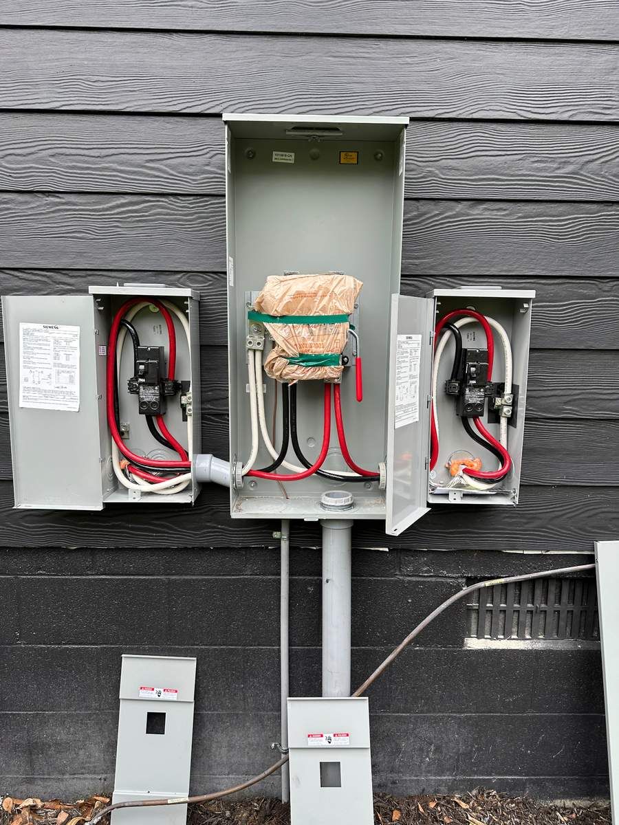Outdoor main electrical disconnect and meter combo installation by Soundside Electrical in Wilmington NC