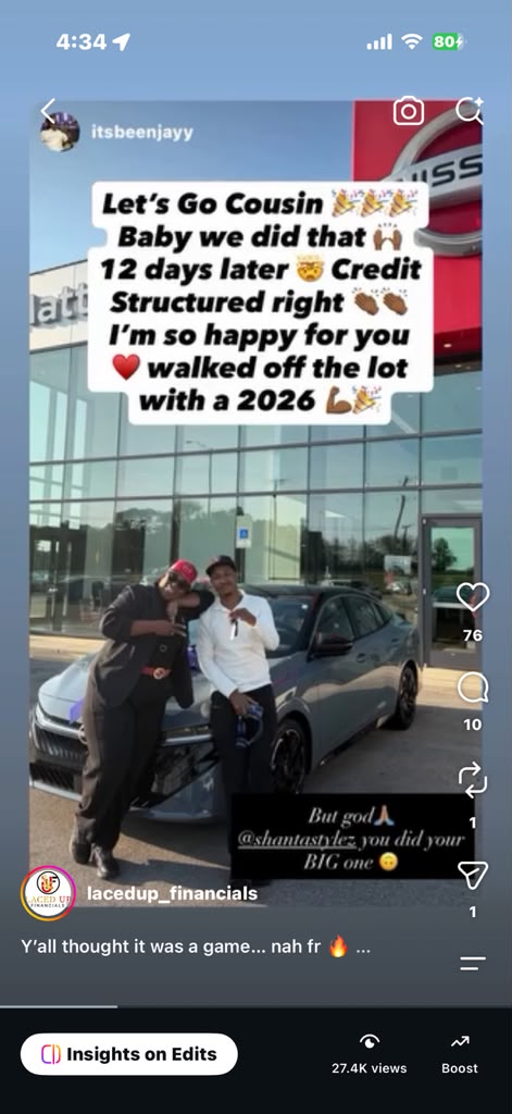 Client celebration walking off the lot with a brand new 2026 vehicle after credit restructuring