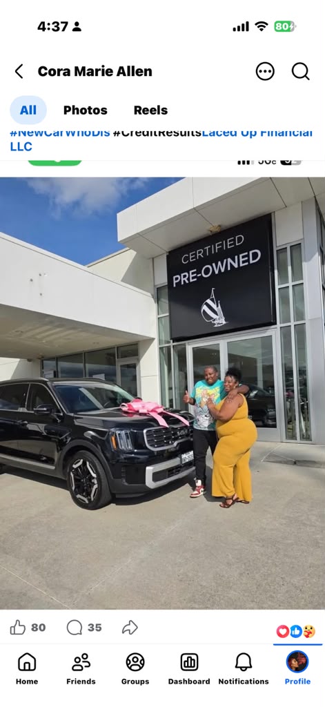 Real client vehicle approval documented at the dealership, showing the client with the approved vehicle