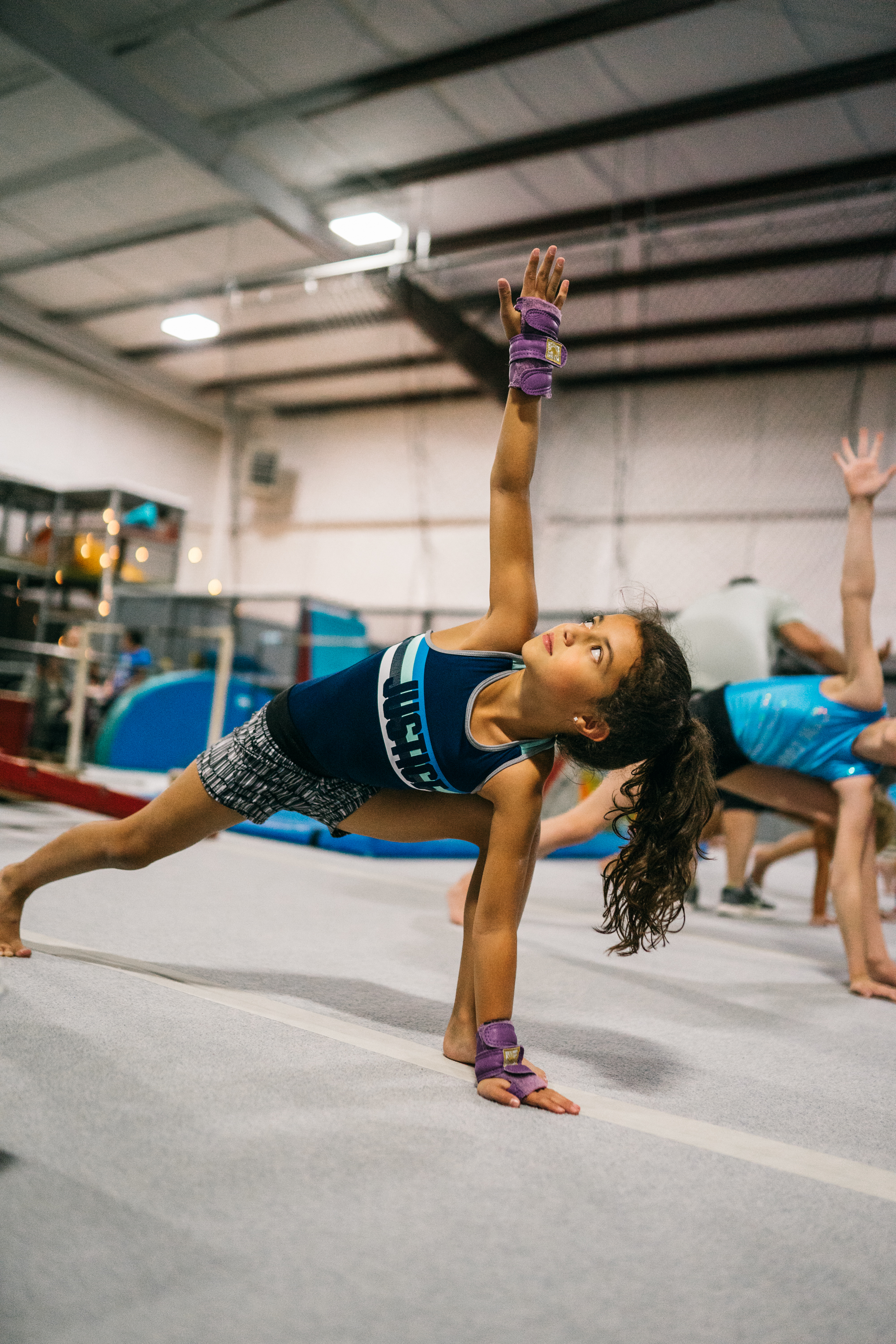 A young athlete playing in the foam pit at Gym Counts