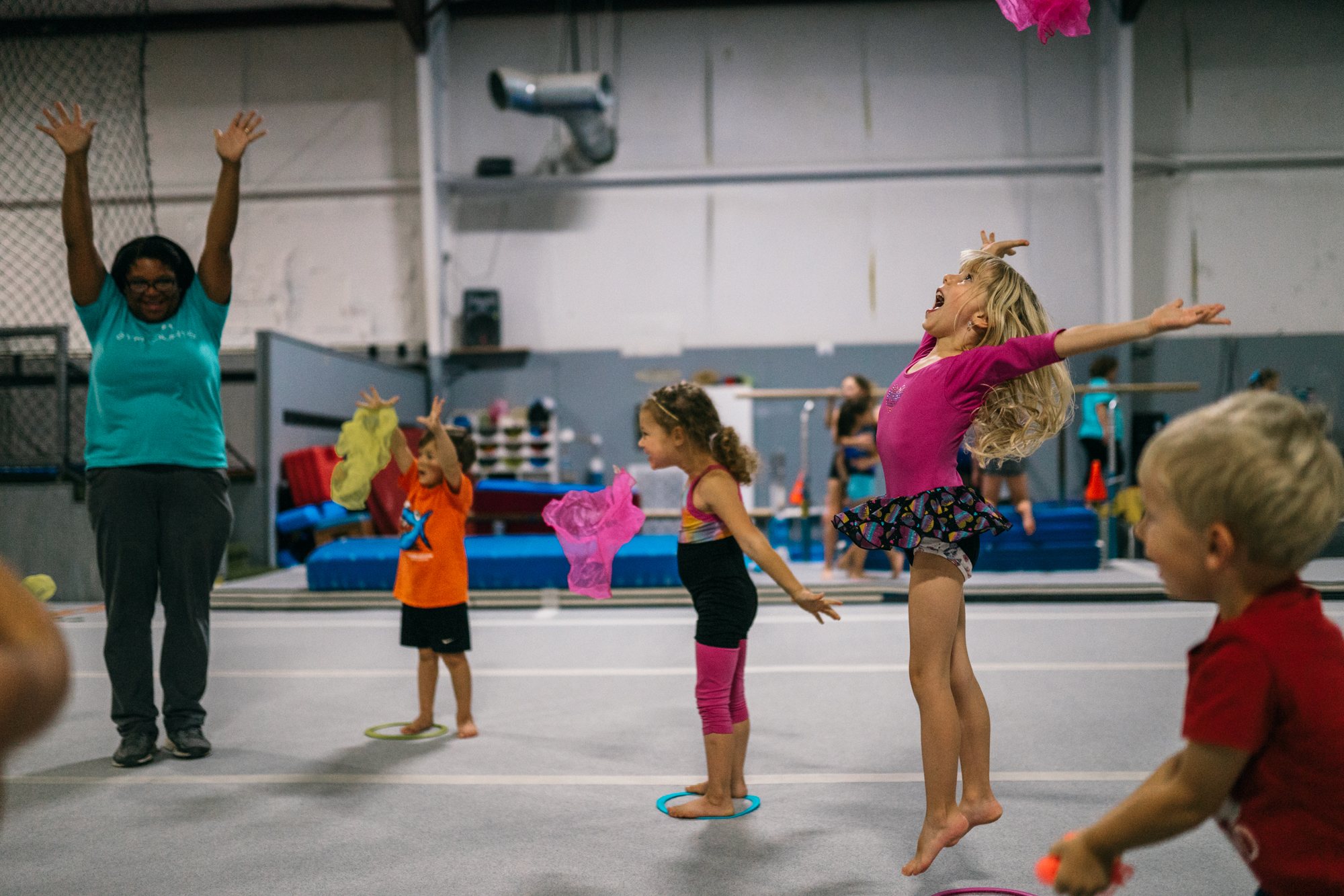 Athlete tumbling on the floor at Gym Counts