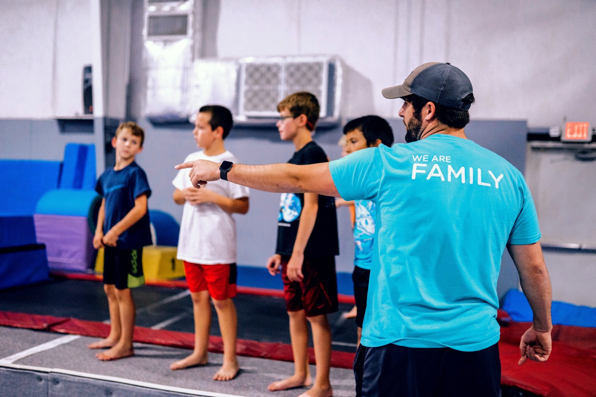 Kids together at a Gym Counts camp session
