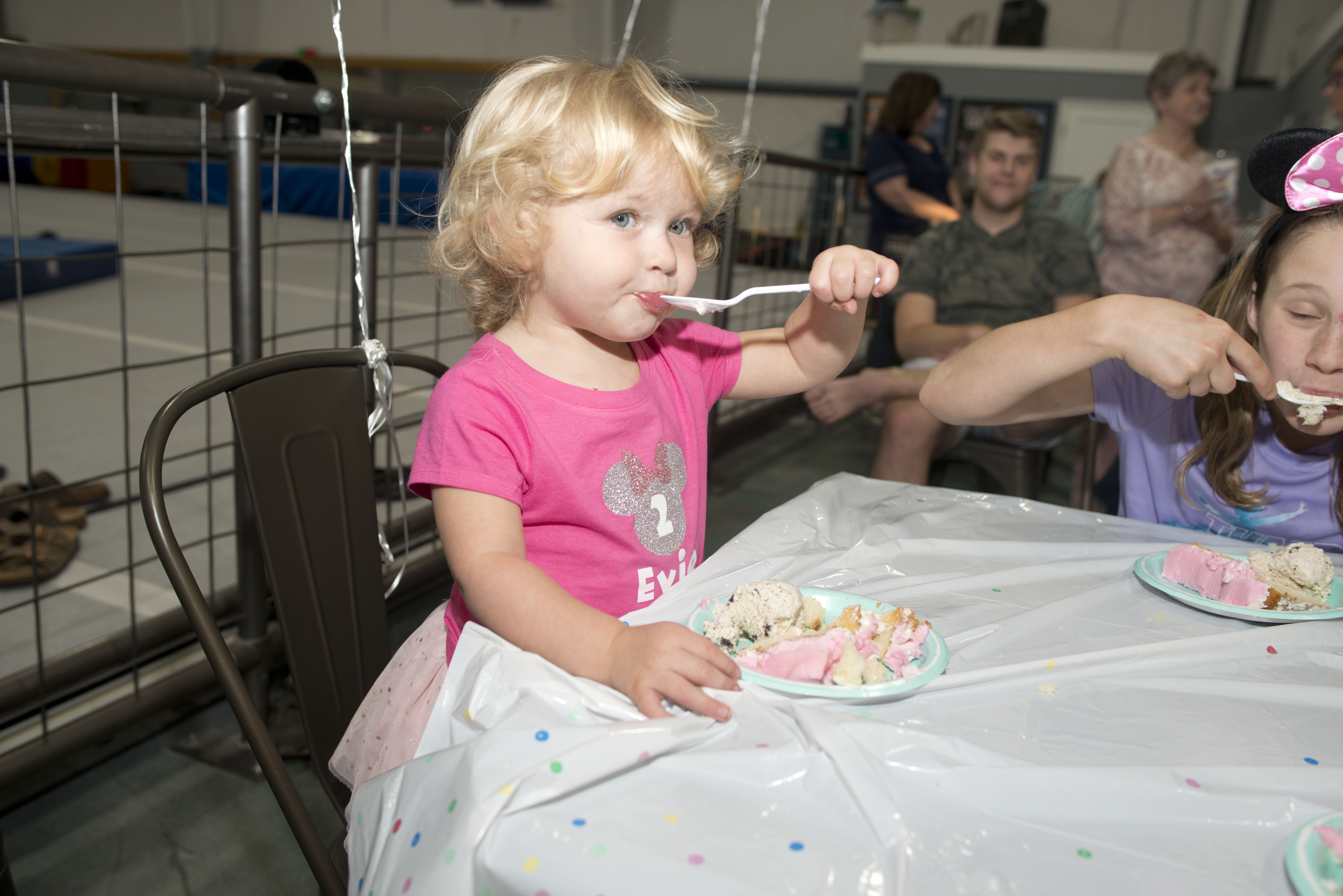 Birthday child celebrating with friends at a Gym Counts party