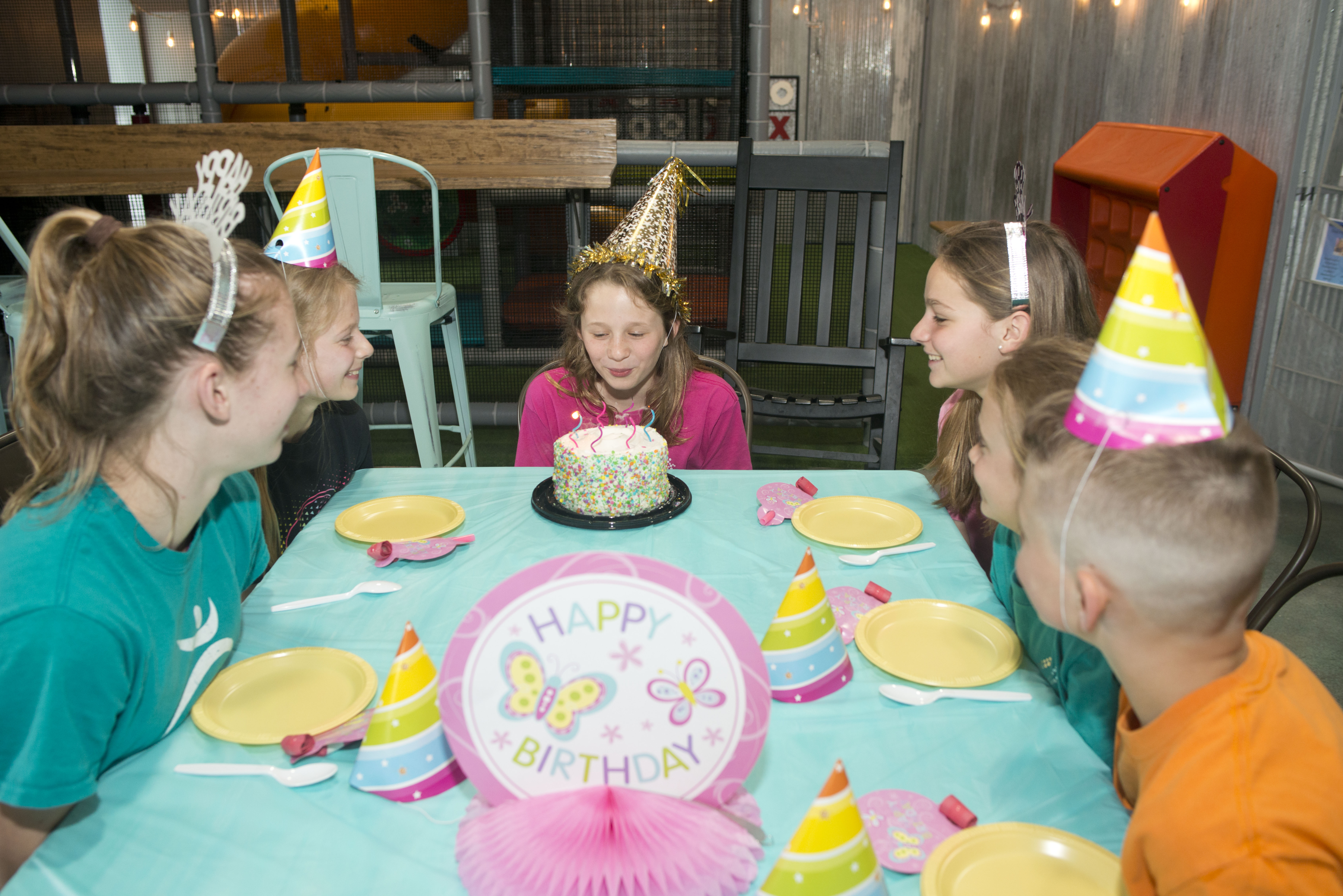 Birthday cake moment at a Gym Counts party