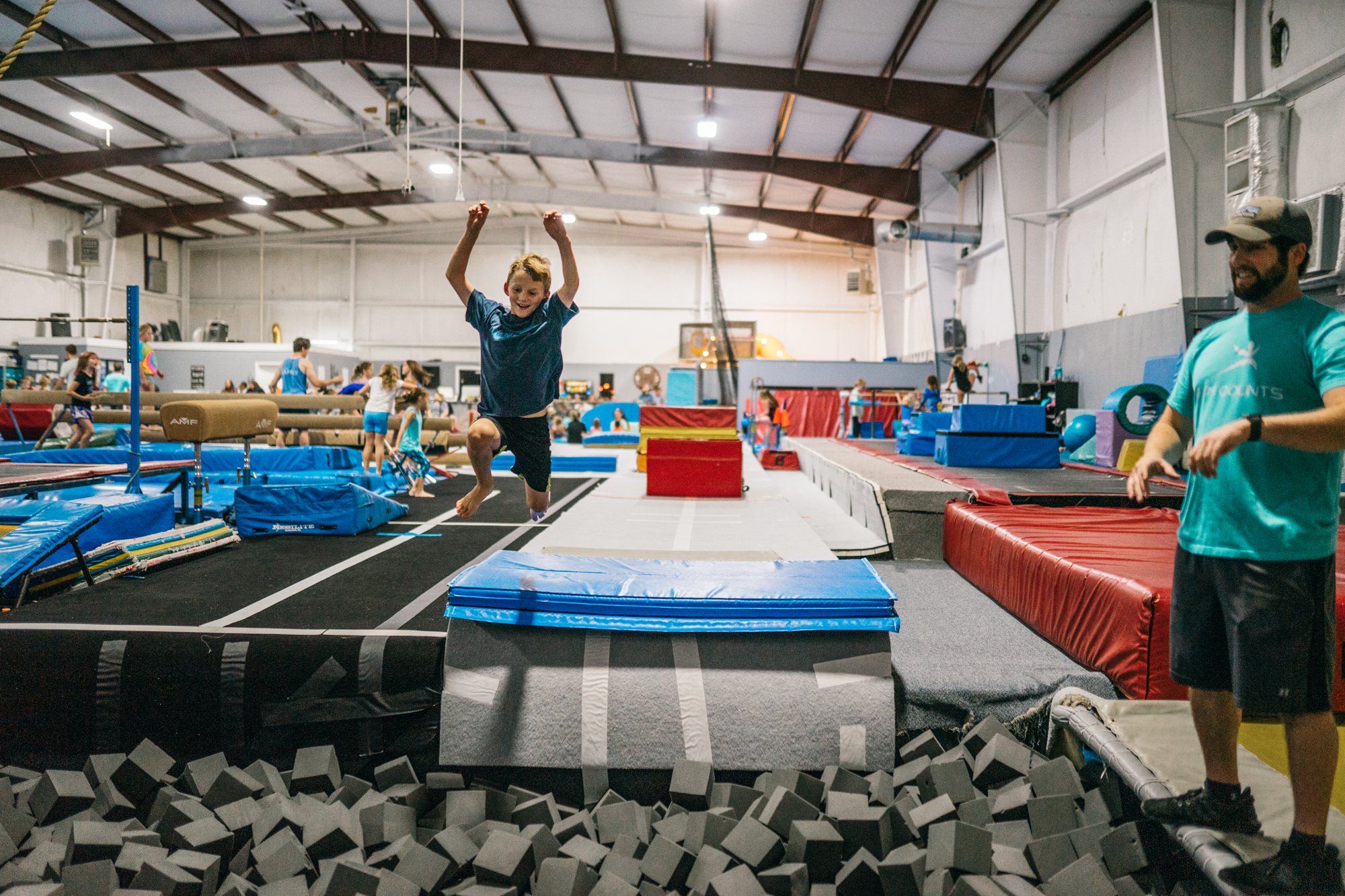 Young athlete moving through a Gym Counts obstacle