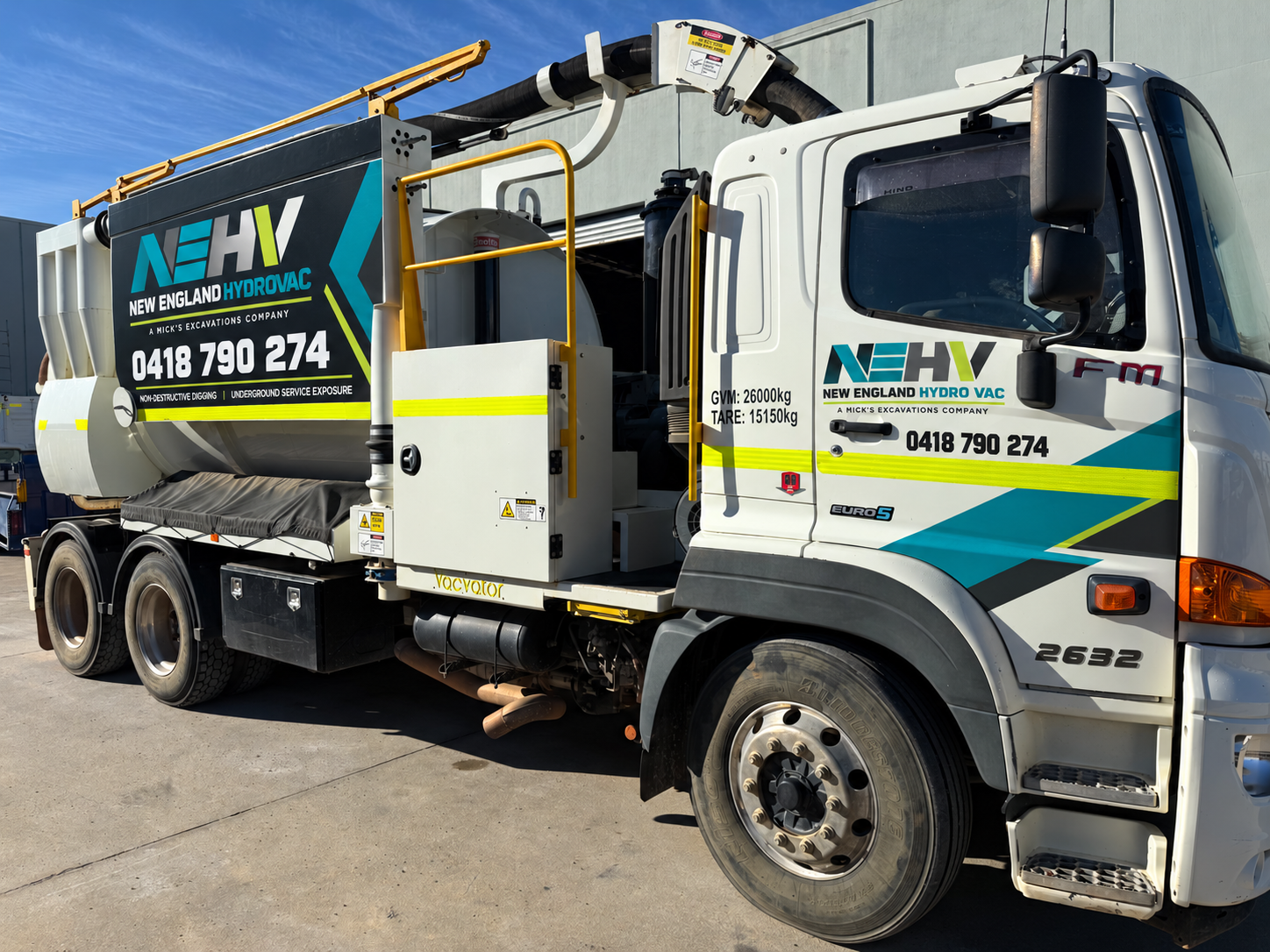 New England Hydro Vac high-capacity vacuum excavation truck on Hino FM2632 6x4 platform operating in regional NSW