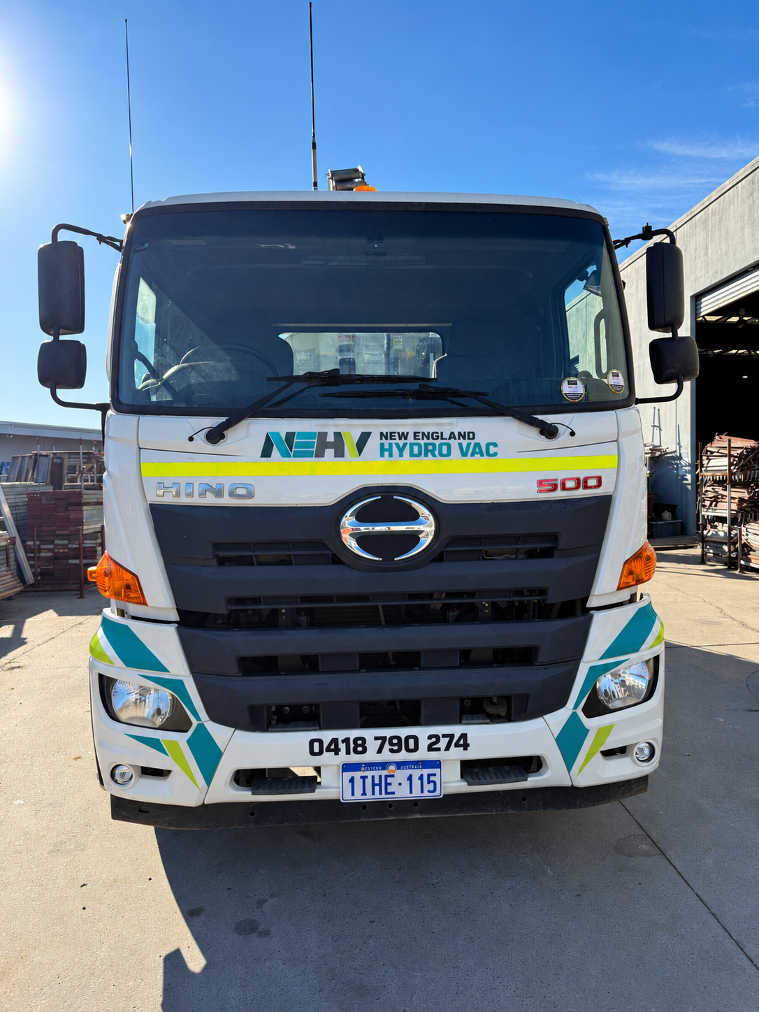 New England Hydro Vac Hino 500 truck front profile with official livery