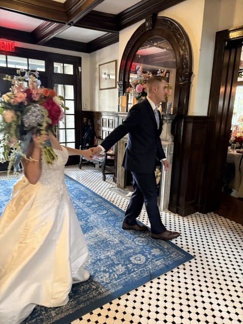 Bride and groom in the pub room