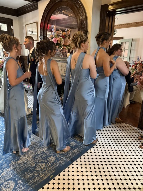 Bridesmaids in blue dresses