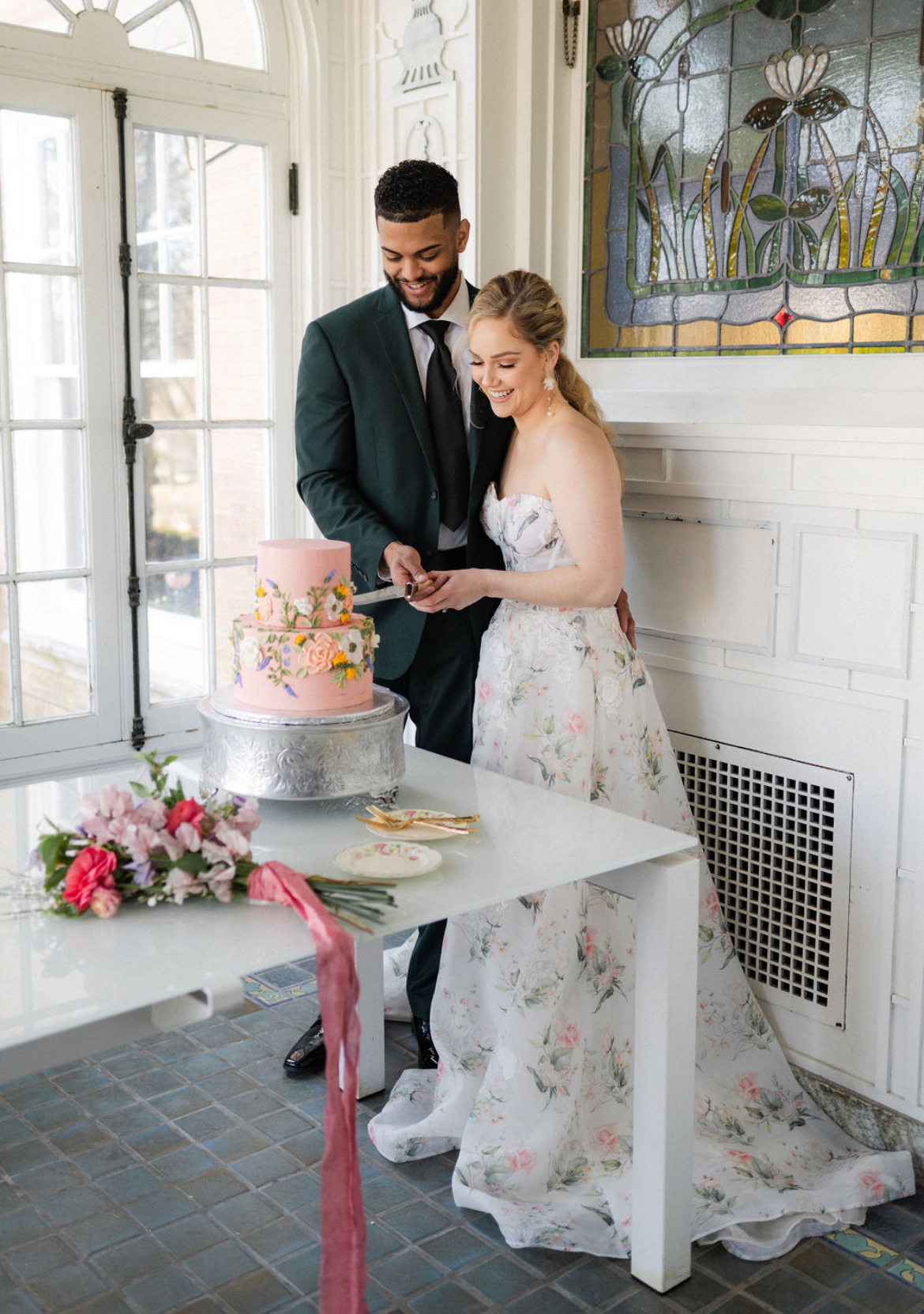 Cake cutting by the stained glass