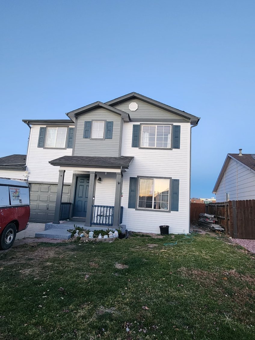 Two-Story Home Siding & Shutters Painting