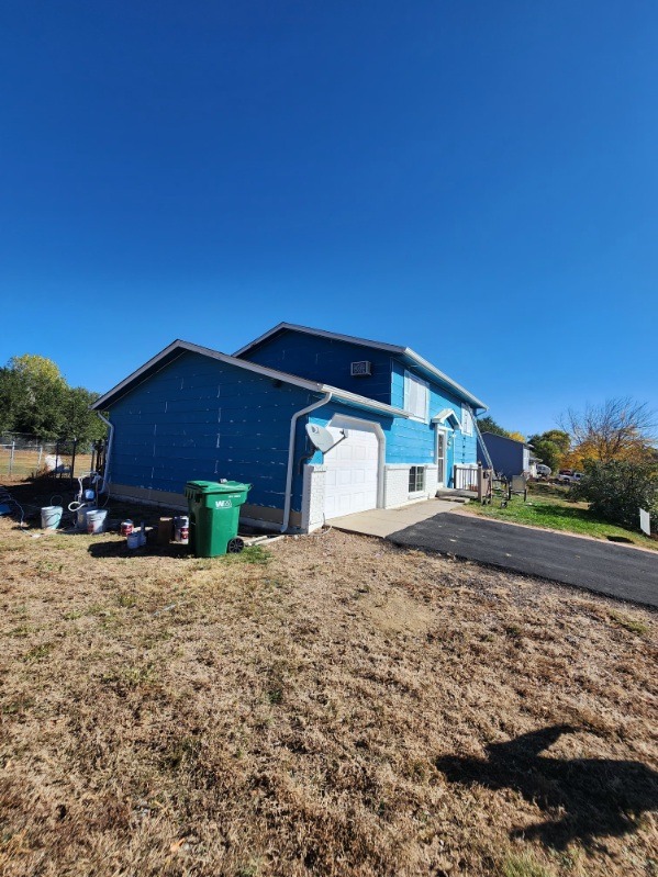 Vibrant Blue Home Exterior Transformation