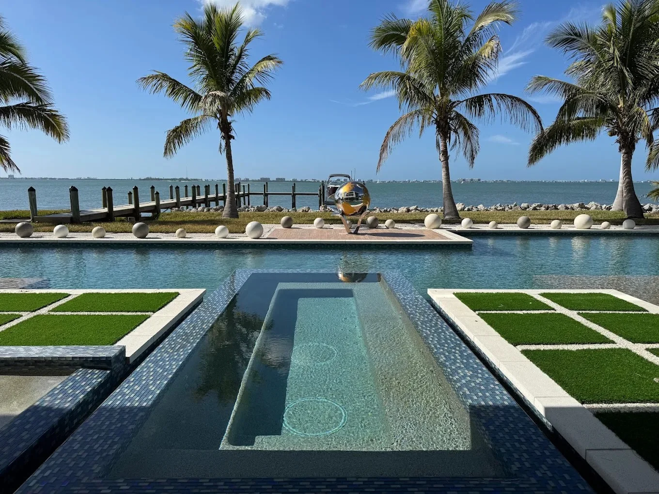 Luxury waterfront pool in Sarasota serviced by Aloha Pool Service