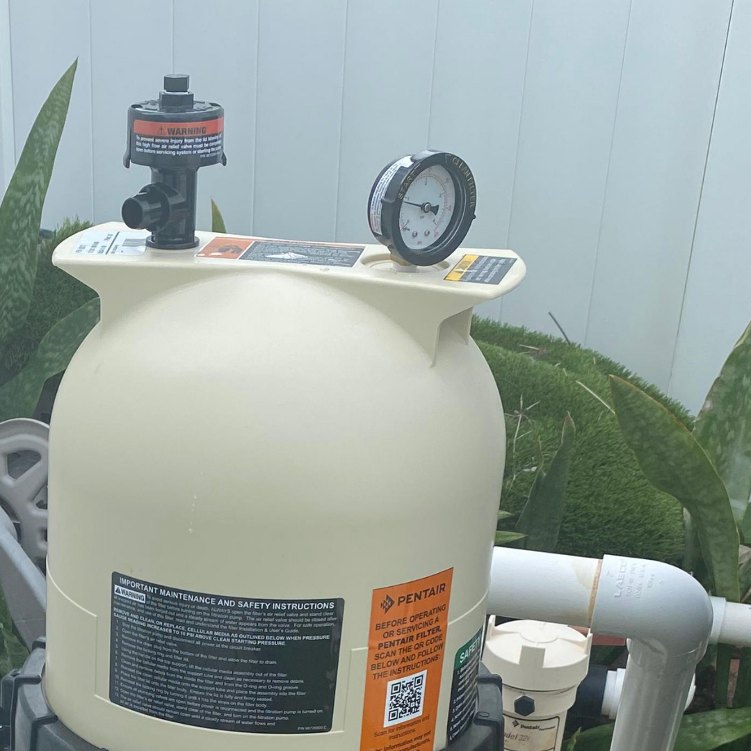 Leaking filter tank or spiking pressure gauge - real pool equipment photo from Aloha Pool Service in Sarasota, FL