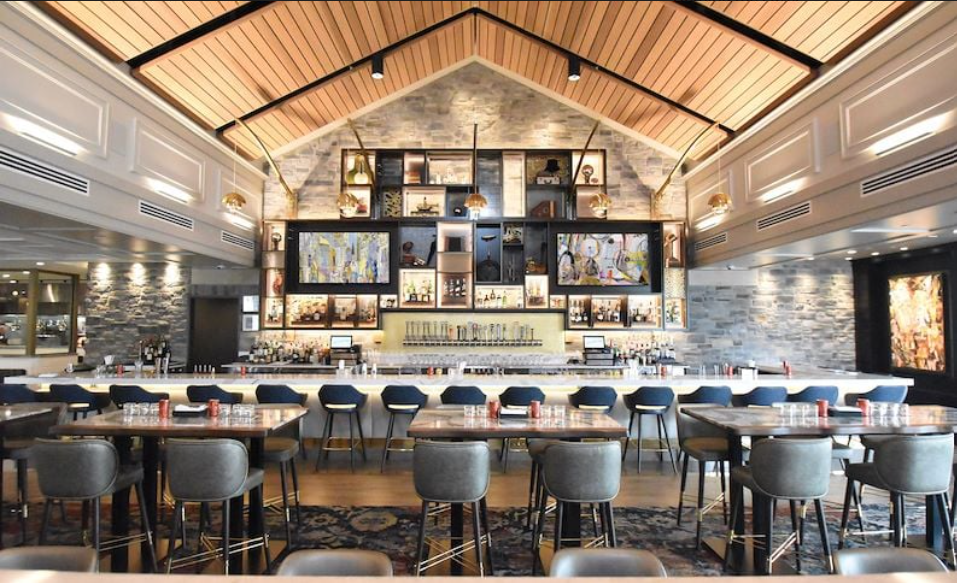 Jazzboline restaurant and bar at Reikart House with vaulted ceiling and curated bar back