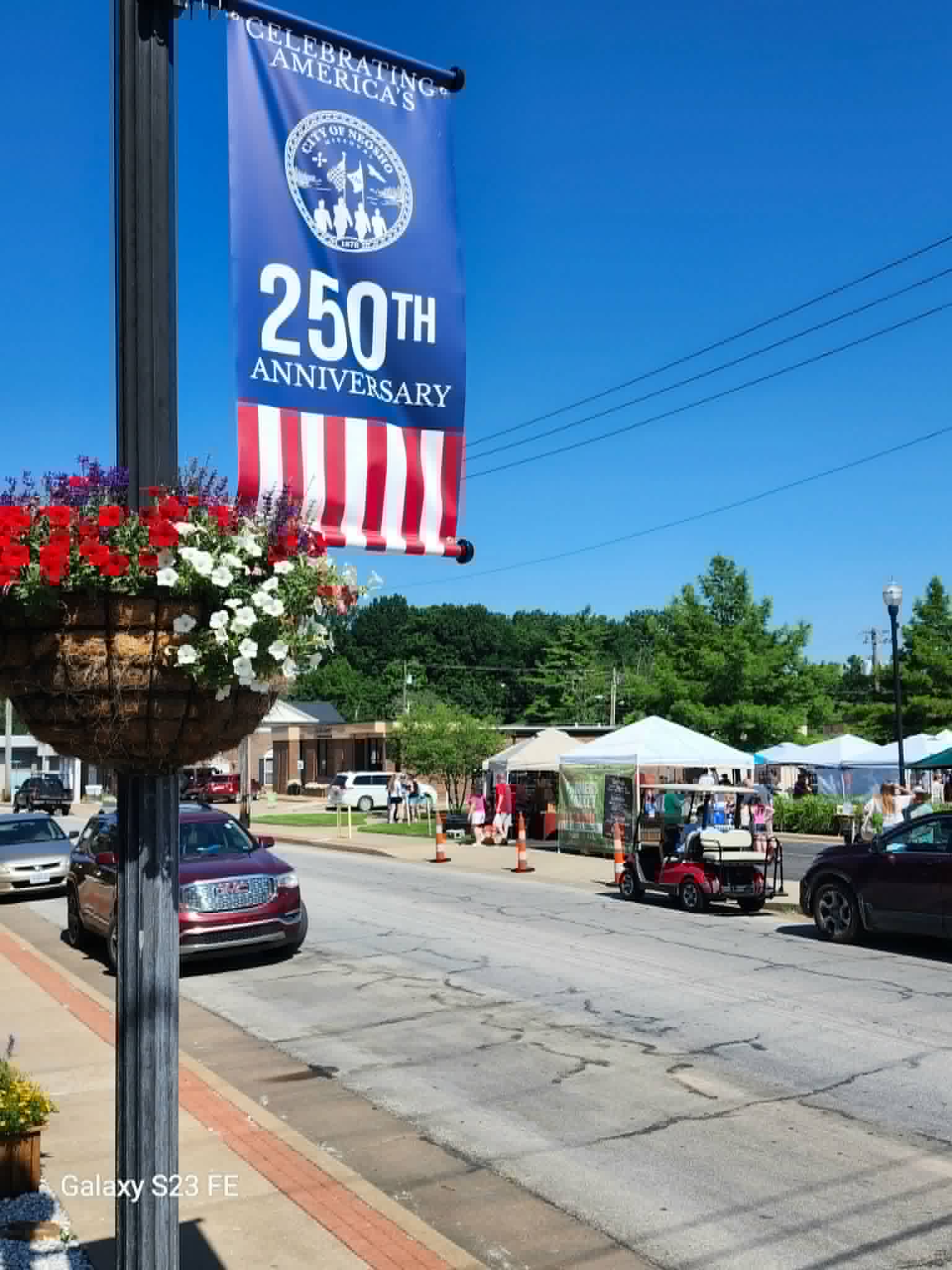 Neosho community street scene with City of Neosho banner