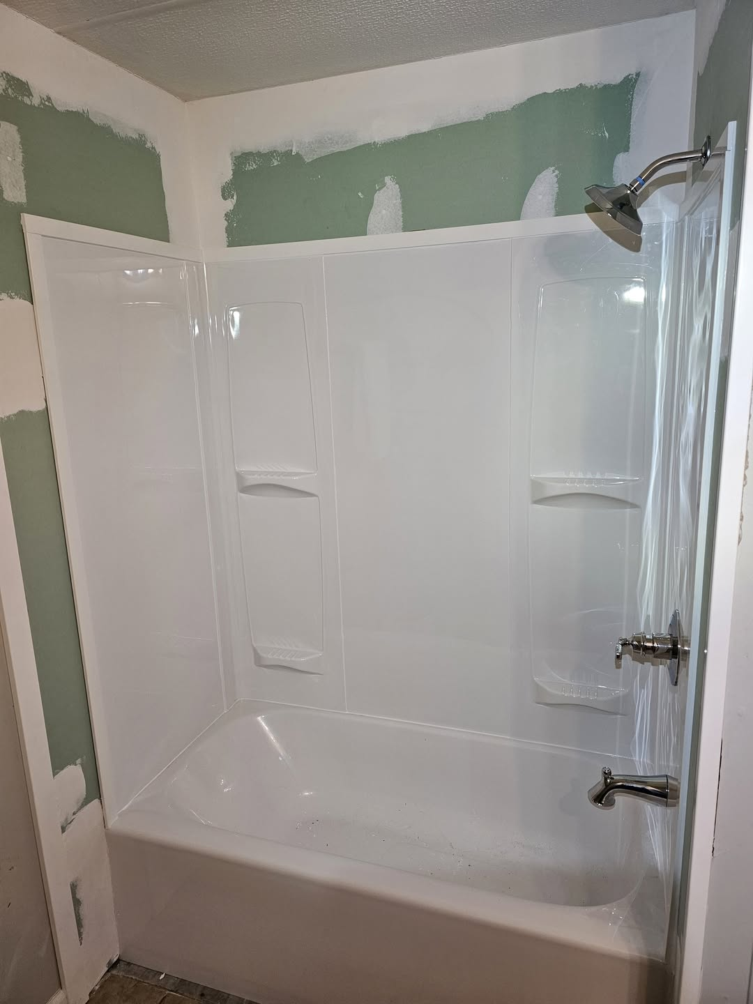 New bathtub and shower surround installation completed by Frazier Plumbing in Bristol, TN