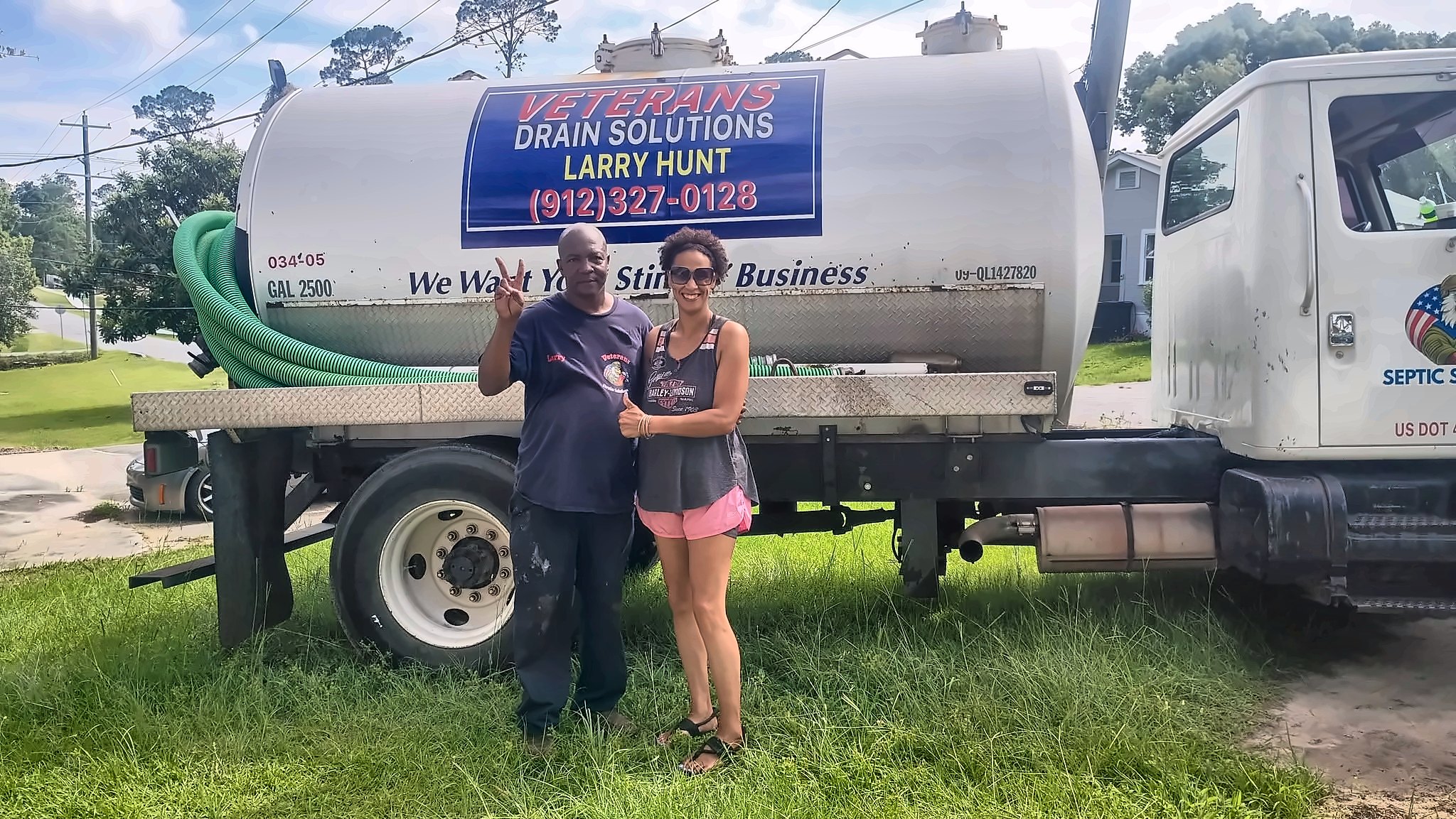 Larry Hunt on site next to the Veterans Drain Solutions truck