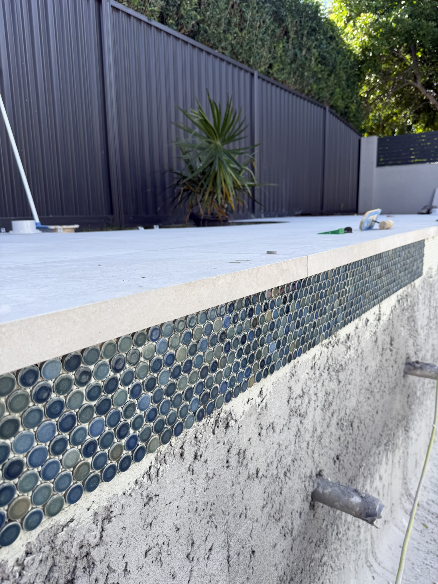 Pool Coping & Glass Mosaic Waterline